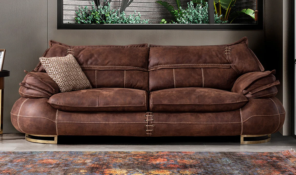 Ornate Brown Three-Seater Sofa